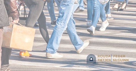 Pedestrians at a crosswalk.